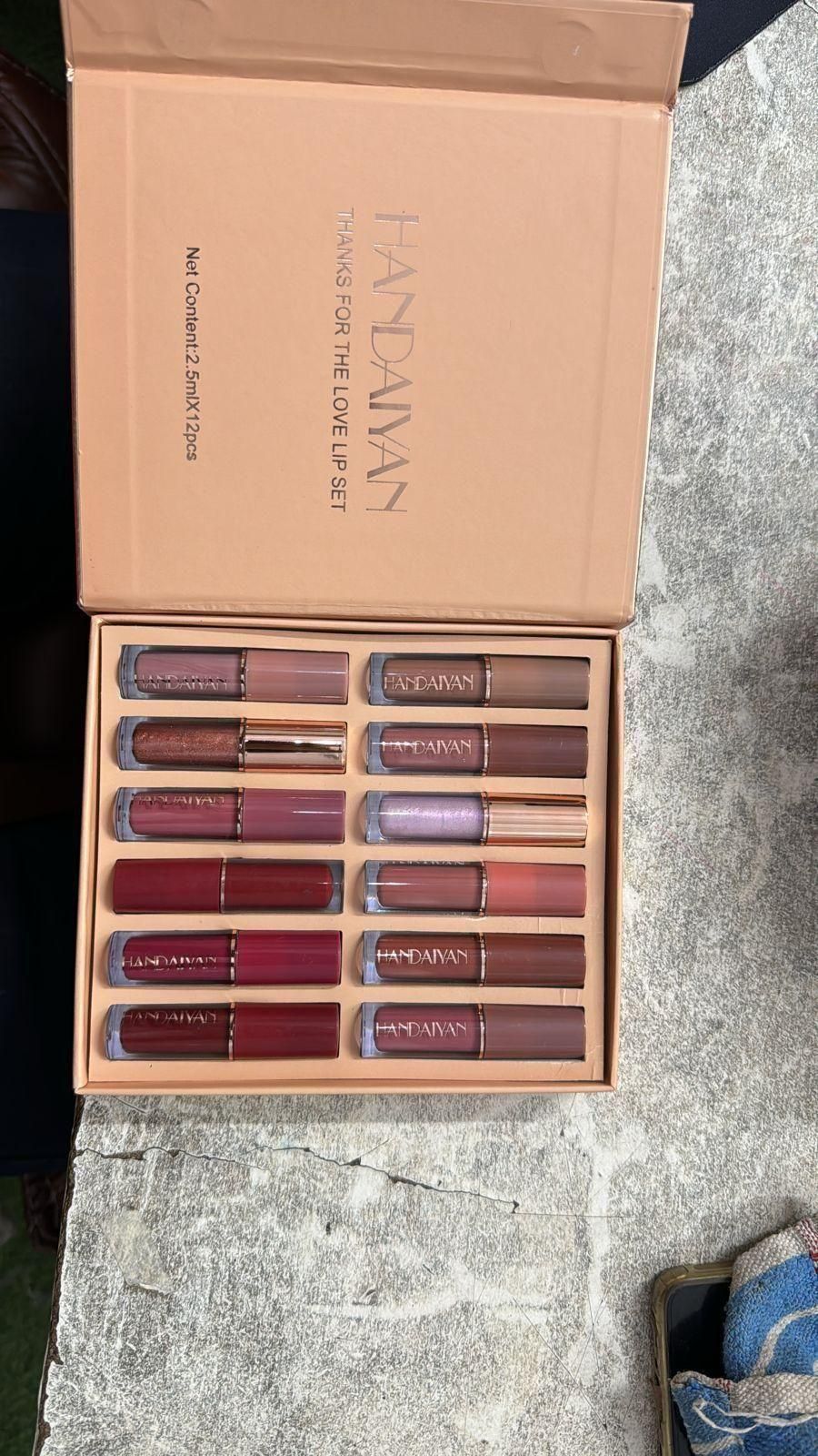 Multiple lipstick shades arranged showing color variety
